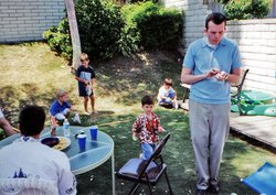 Picking up the pinata pieces at Christian's 3rd B-day